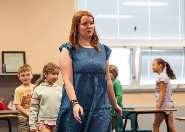 A teacher in front of a classroom
